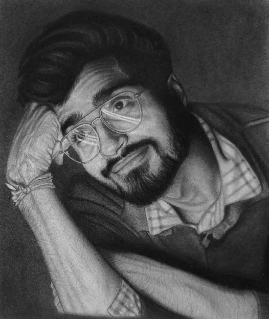 Charcoal portrait of man with glasses resting on hand by Sumit Kumar sketch artist Patna Bihar